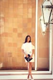 It is the perfect length for someone with longer legs, who tend to make most dresses look way too short. The color has a really pretty shine to it, and the fabric is very nice and thick, so it isn't see-through. - Valeria E.