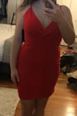 The material is nice and think you can't see through it at all. Straps are always so long on me because I am short so when I tighten them the clasp ends up being in the front, but I don't mind too much. The red is nice and bright! A little bit big in the bust area but not bad. - Jacquelyn K.