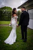 I did need to make a few adjustments to the dress, but it was completely worth it. I felt like the most beautiful bride on my civil wedding day. The quality is divine, and every detail is simply exquisite. I couldn't have chosen a more perfect dress. - Stefanie G.