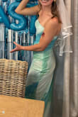 This dress exceeded my expectations. The colors were vibrant and fun! I normally have issues with strapless items, but the dress stayed in place the whole night even when there was some running and dancing going on. Might have to buy it in the other colors! - Andie R.