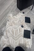 A little big but I like the item, good quality - Teresa R.