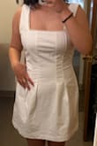The pearl detail looks very elegant and adds a nice touch to the dress. However, the straps are too loose and keep falling off, which affects the overall fit. While a size 6 fits my body well, the top does not feel secure. Additionally, the bottom flare has a boxy shape that isn't very flattering. - Shaira M.