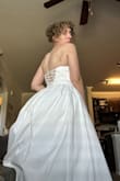 Love the way this feels. So elegant and comfortable. It's just a little structure without being stiff or stifling. I bought a crinoline to go underneath for more volume, I'm putting sticky pads into the cups because they don't have very much structure (more suited to larger chest probably). The only thing I don't like is the the hips are a little low-cut, wish the skirt was higher on the sides for a corset-basque waist. I'll probably have it slightly altered to flatter me better. - Audrey B.