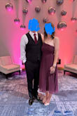 Fits very tightly in the bust area, but not to the point of being uncomfortable. It stayed in place nicely, and I never had to worry or fiddle with the dress during the night. Great dress for a wedding! - Rachel L.