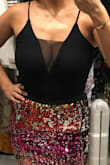 Cute top. Find the XS/S a bit tight on my chest and it makes it revealing but super cute with a high waisted skirt. - Justine G.