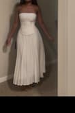 Honestly obsessed with it! It's so pretty, classy and I like the corset aspect of it. I have a smaller waist and bigger hips and it was perfect. p.s. excuse the kinda blurry pics, they're screenshots from a video lolz - Joyce N.