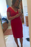I love this red dress it was a great balance of subtle sexy with the longer length but low neckline and back zipper detail. It got pretty snug on the top and the material was thick enough to keep everything looking smooth. - Nicki R.