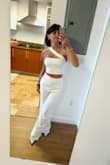 I purchased this and another dress on Lulus for my wedding. Finally, I decided to use the other one, but it was a very hard choice! This two-piece jumpsuit is simply wonderful and super elegant. As I'm not very tall, I had to shorten both the pants and the top's strap, but it fits me perfectly! I'm going to use it at my Company's party tonight. - Michela B.
