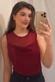 It's a perfect going-out top, and the fabric is breathable. - Marwa N.