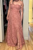 I am typically a L in Lulu's sizing, but this dress was really tight on the bust. I could still zip it up, but it squished me in a way that was unflattering. Consider sizing up. Otherwise, really beautiful dress! - Natalie A.
