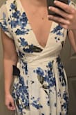 It is a beautiful dress however the top is very tight and shows way more chest than I would like. - Katelynn S.
