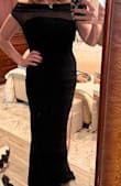 After ordering several options, I decided on this dress. Classic black, sophisticated, classy yet enticing. Fits and wears well. Very comfortable except for mesh at arms. Nothing too uncomfortable but could be constructed a little differently for better fit. - Ginger S.