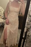 This dress fits perfectly! It's fitted at the top but comfortable. The length is perfect, and I love the slit. - Donavan W.