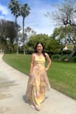 I wore this dress to my friend's wedding, and I got so many compliments! I wasn't sure if I could pull off yellow, but it's a light enough butter yellow that makes it flattering. The dress is so flowy and gorgeous when walking or in the wind! The floral pattern is also so dainty. I fell in love with the dress!
I gave it 4 stars because the fit needed work. I've always worn an XS in Lulus, but I had to size up to a S, which is weird because I still fit into my XS Lulus dresses! I literally could not breathe in the XS. I also had to get the dress hemmed because it was too long even with 4 inch heels, but that was expected since I'm 5'1. If you're small-chested, the chest area might run a little big, but my tailor added padding that helped make the dress look better.
The quality also wasn't great. The first time I ordered this dress it came without the metal clasp at the top of the zipper, and the second had broken stitching below the zipper, so the fabric was coming undone. An easy fix, but could be improved! - Keilani F.