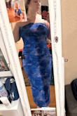 It fits like a glove! I'm usually against strapless, but I have a good strapless bra; it has a sturdy elastic band at the top, so it doesn't slide down. It fits comfortably on the body, forgiving for my back rolls because it's not like silk; it has layered ruffles, so you can't see my extra weight. For my busty girls, you can't go without a bra; it's not tight enough, so either tape the girls up or use a good strapless bra. But the dress isn't coming down! - Grace Z.