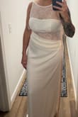 This dress was not flattering at all. I would need to size down, but if I did, the fabric going across the chest would be way too small - Amanda B.