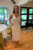 This dress is gorgeous! It turned out far prettier than I was expecting. It was incredibly soft and comfortable, and the texture ended up feeling thicker than just a slip dress. I'm a 32DDD bra so I ordered both a small and a medium. The small fit my waist down but was too tight on my chest so I went with the medium. If you're a bustier person, I would size up. Otherwise really cute! - Tatum Z.