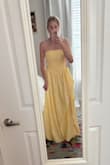 This dress was such a beautiful buttercup yellow color and made me feel like belle! The basque waist was stunning and super flattering - Denise G.