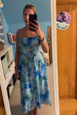 I initially ordered this and another dress in a size small. The other one fit very well and since it's stretchy; it fit perfectly. This dress isn't stretchy, so the waist part was a little too snug. I also have flared ribs so that doesn't help. I exchanged for a medium, and it fits so much better! You need a little extra room for a wedding with food and drinks, and this dress is going to be perfect for the summer! So flowy and cute! - Vanessa P.