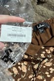 I am LIVID! I ordered a size large, their packaging said L for LARGE! the dress inside, cheap fabric, and SIZE MEDIUM!? Are you kidding me? For spending $60+ on a dress, they better send the right freakin size at the LEAST! This is some SHEIN quality BS - Heather-lynn K.