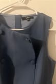 Item came damaged with buttons loose and stitches out ): - Bridget M.