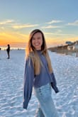 I NEED this to come back in stock, with more colors. I would wear this sweater every day if I could; it is so comfortable and easy to style. The material pulls a bit after a few washes, but I literally shave that off so I can keep wearing it. - Emily I.