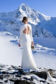 Loved this dress. Wore it on a glacier in -20, was able to find layers to wear underneath, and the dress still fit perfectly. Get compressive undergarments as it is pretty snug fitting. Had pink dots under the buttons, but they were heat reactive and went away once it steamed it. I would also recommend steaming it before you try it on the first time. It looked like a WAY nicer dress once I steamed it. - Caroline C.