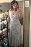 Absolutely loved it. Not transparent at all which I love especially in the breast part, so I don't even have to wear any type of cover and has the right type of support to keep the girls up. Snatches me up around the waist and is comfortable when sitting down. Would make it even better if it had pockets but oh well, still a nice dress. If you're like me and not looking for a full white dress that is tea length but snatches you up and looks formal, this is it! I would add my grad pics with it, but I haven't taken them yet. - Yaiznelle D.