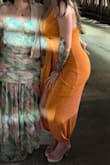 This dress fits perfectly. It's super stretchy so it makes it easier to be confident in. The top is a deep V but still attractive. It's comfortable and flattering in the right spots. I would definitely recommend this item to a friend. - Kelley S.