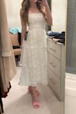 It fits true to size and is very flattering. Looks exactly like the photo. - Jenna S.