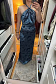 The front view of this dress is actually decent but the side view is laughable. I'm a small chested girl but it's hard for me to visualize this fabric sitting super well for anyone. The dress is most fitted around the waist. It was the right size but definitely didn't have give so keep that in mind. The low back is great, the best part of the dress for sure. - Quinlyn J.