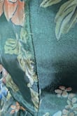 Dress arrived damaged with the bust seam ripped. Missed the 10 day window to return. Disappointed in quality. - Remi M.