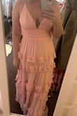 The fit was great, so no issues there really. I liked the top part okay since it was adjustable, but the bottom just made me feel like a giant birthday cake with the ruffled tiers. I couldn't un-see it. Just did not like the look of it on me. - Bailey O.