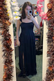 It's good material and fits mostly well. Just too long for me, but I tend to have that issue with pants and dresses anyway. The picture is me with four inch heels on and it's still too long, but everything else fits well. - Kailey S.