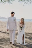 My husband and I made a last-minute, whimsical decision to elope in Costa Rica, which left me with only a few weeks to find my dress. As someone who is quite petite (5 ft tall), I felt discouraged after visiting local boutiques, many didn't carry smaller sizes, and I didn't have the time (or budget) for major alterations.
After lots of online searching, I came across this dress and instantly fell in love with how simple, romantic, and flowy it looked. I took a chance and ordered it, and I'm so glad I did. It arrived within a few days and fit beautifully. I only needed a simple hem, which was such a relief.
The fabric is light and airy, which made it absolutely perfect for a destination wedding in Costa Rica. I couldn't be happier with my choice, it truly felt like the dress for my special day. - Lindsay S.