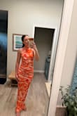 I ordered this dress for an upcoming wedding this summer. I usually don't like tight fitting things on my body, but this just hits every spot so flattering. It has ruching throughout the dress, which is just beautiful. I can't wait to wear. - Maggie