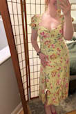 I ordered this dress to wear as a guest at a bridal shower. I typically order size large, but the large was out of stock, so I thought I would try the medium. I think it fits just fine! Definitely a little tighter right under the chest, but the fit seems to work with the shape of the dress. The pattern is really fun- there's even a light cheetah print type pattern within the green of the dress. Very happy another Lulus find! - Emily B.