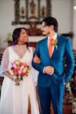 I wore this dress for my wedding, and it was perfect. The cut worked beautifully for my petite, curvy figure. For my church ceremony, I added a cape and lace detail to the neckline for more coverage. The slit added a fun touch, and it felt ideal for my outdoor wedding, not too simple or too formal. It was also very comfortable in hot weather, and I didn't feel overheated. The fabric felt good, and the overall quality was great. Excellent value for the price. I had to tailor the length and adjust the straps slightly, but otherwise it fit like a glove. I'm 5'3 with a 40" bust (34.5" underbust), 33"34" waist, and 41" hips. One small hook broke from dancing, but the zipper stayed secure all night. - Rixmar B.
