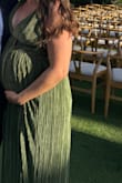 Just wore this dress attending a wedding at 20 weeks pregnant! It was a beautiful dress and high quality. I do think the chest area ran a little tighter than expected but overall I was happy with the dress. Would recommend for anyone looking for a bump friendly formal/black tie dress! - Kayla S.