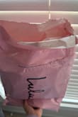 The package arrived opened, as did the smaller plastic bag that the dress comes in. The outer material was also falling apart and had many threads coming loose. - Nishka R.