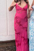 I bought this for prom and wore it once and tried it on two times before. The top straps both were fraying and one broke an hour in. It stayed the rest of the night after I sewed it back on. It was baggy in some places and I had to tie it pretty tight to get it to fit which pulled the top to a weird spot. I think I could've gotten an XS and that wouldn't have been an issue. Also, the sequins were scratching my under arm but that happens with any sequin like dress. I would recommend Vaseline or Aquaphor! The colors are so beautiful! - Lelaina T.