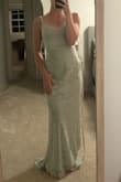 This dress is absolutely stunning and fits exactly how I'd like it to. It does run slightly on the larger side, only because there's no elastic in the fabric or straps. I typically wear a size small, but I had to get an XS in this dress so that the straps would stay up and the back wouldn't be baggy. That said, I am lean/athletic built with a flatter chest, so this is common for me. But it is super comfortable and very flattering. Definitely recommend! - Catherine S.