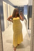 I got so many compliments on this dress! It was stretchy, comfortable, and fit great. The color was also perfect. My only complaint is that the top is a little see through and the wire on the side cut into my arm pit through the night. - Kylee A.