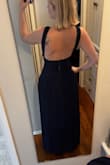 Bought this dress for a black tie optional wedding. It is beautiful but the waist is tight!! The fabric has no stretch so if you aren't as hourglass shaped or have wide ribs, you may need to size up. Lots of room in the bust, I will need to fashion tape it to be safe but it looks gorgeous on. - Elizabeth K.