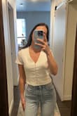 Very simple top but so cute with jeans, shorts, or even a skirt! Fits true to size. - Jessica J.