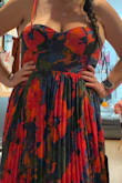 I have a large rib cage and am a D cup and thought this fit very poorly. It zips and everything just fine, it just doesn't look good. The quality again, sucks. Wouldn't order from Lulus again. - Lindsey C.