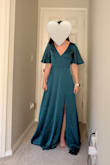 The color and texture of this dress are lovely. But way way too long like a lot of Lulus dresses. My husband also thought the specs were a little too long and baggy. Overall I just felt a little frumpy and wished it looked more like the model. Probably would look better with a bigger bust. - Jamie F.