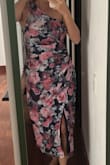 The dress came kind of big in the chest even for me (I'm 34DD) it feels big. It's a loose dress in the bottom, so if you like something like that it could be comfortable. The fabric is really good. - Gabriela T.