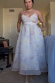 This dress fit perfectly, I got it for my after wedding party, and it is gorgeous!!! The fabric makes the dress look more fluffy, which I loved! - Andrezza N.