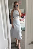 This dress fits wonderfully. I have learned to size down in all of Lulus things, but it fits perfectly once you do. This dress is so beautiful. I love the cutout. - Maci T.